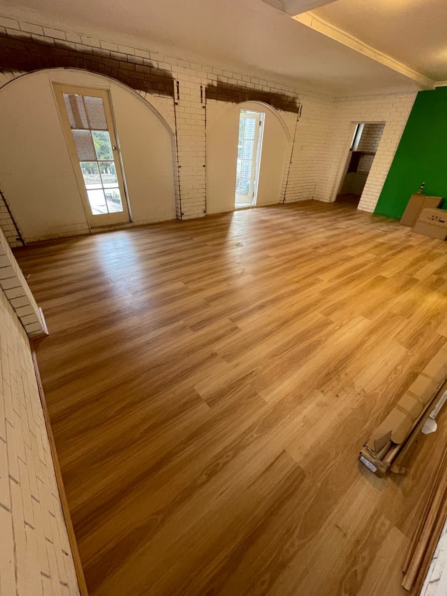 Large open-plan commercial space with new flooring